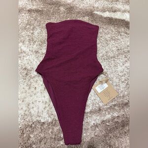 Stone Fox Swim Strapless One-Piece Swimsuit in Deep Berry